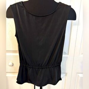 Express Spandex Top! Ties in the back at waist with a glitter drawstring